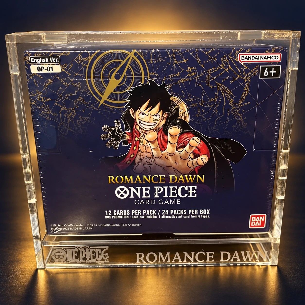 Caja de metacrilato alrededor de una Booster Box de One Piece